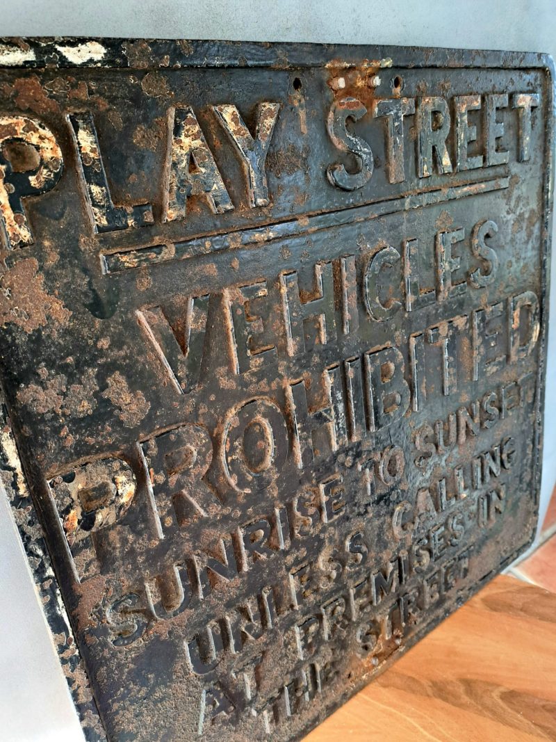 play street cast iron sign