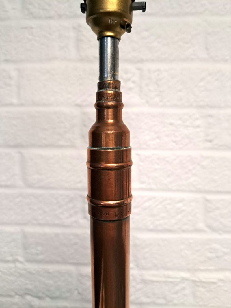 brass and copper floor lamp
